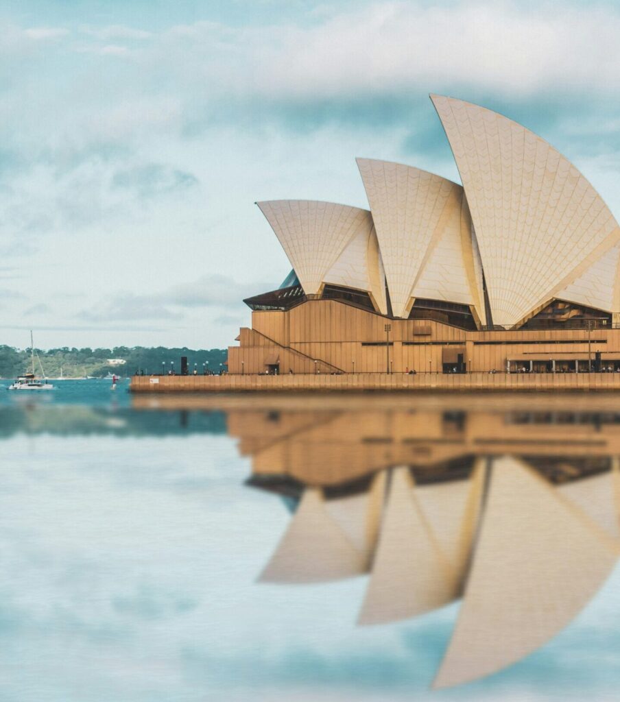 Sydney Opera House reflecting off the water, creating a stunning mirror image