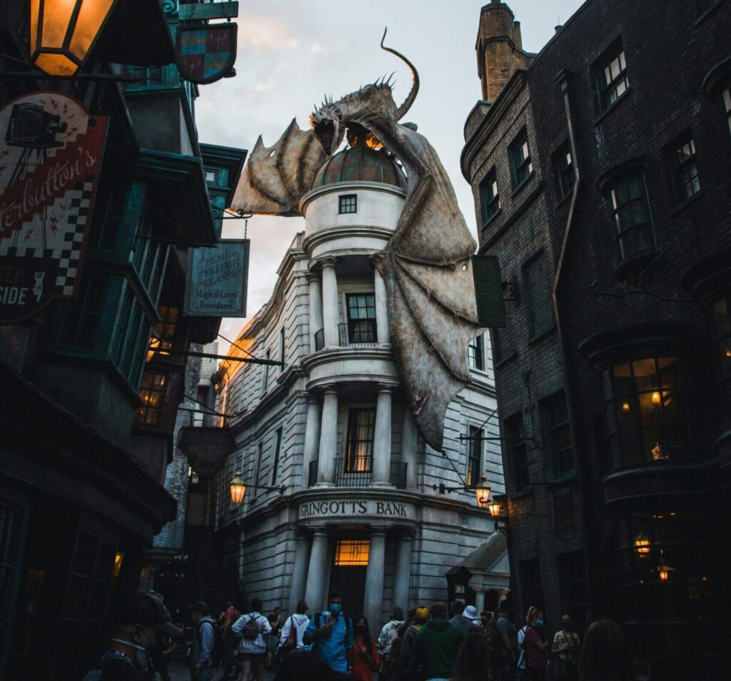 In Orlando, Florida, the Wizarding World of Harry Potter features a dragon atop Gringotts Bank, adding magic to the enchanting landscape