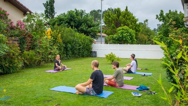 Students at Le Bon Mot Tours | Language Travel practicing yoga