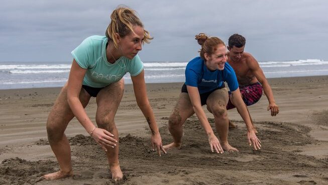 Students learning how to surf in Ayampe surf with Vistamar Guest House