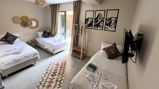 Accommodation and three beds of Harmony Surf Lodge Taghzout surf camp