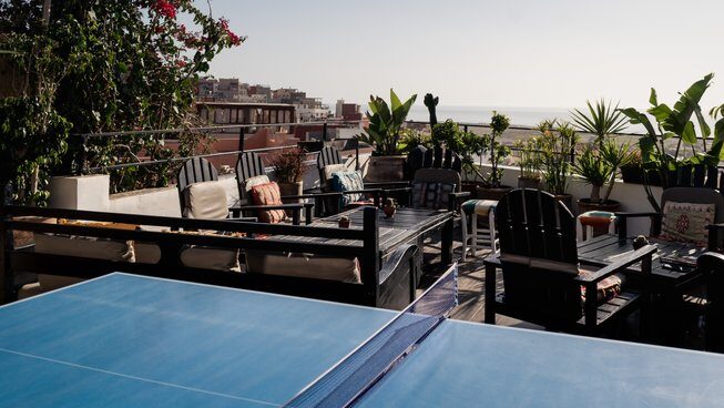 Balcony with a ping pong table at The Surf Hotel Morocco surf camp