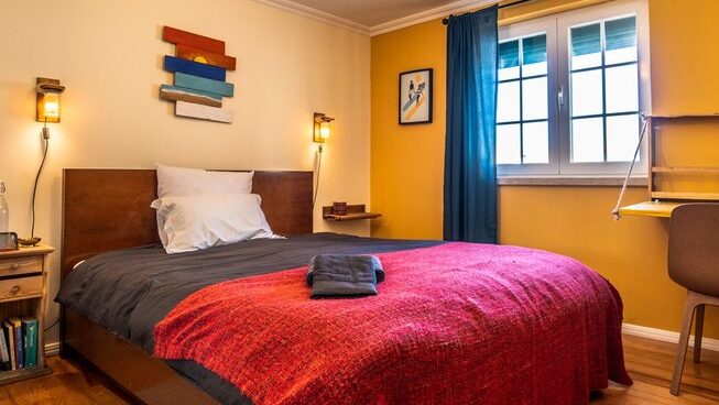 accommodation with bed at Peniche Portugal with Ahoy Surf House surf camp
