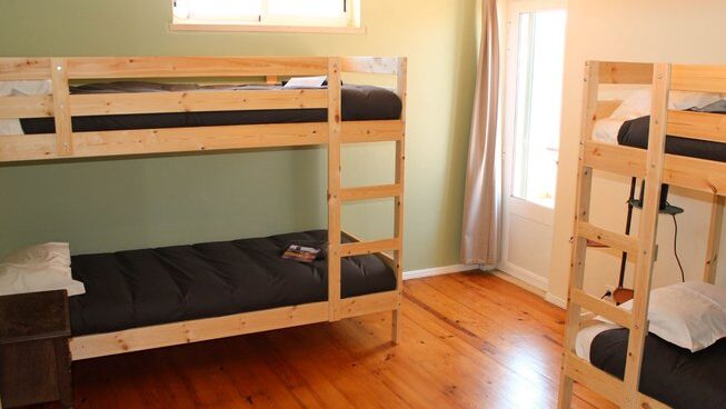 accommodation with bunk beds at Peniche Portugal with Ahoy Surf House surf camp