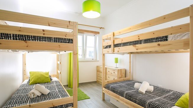 dorm rooms with bunk beds at Alex Surf School surf camp in Peniche
