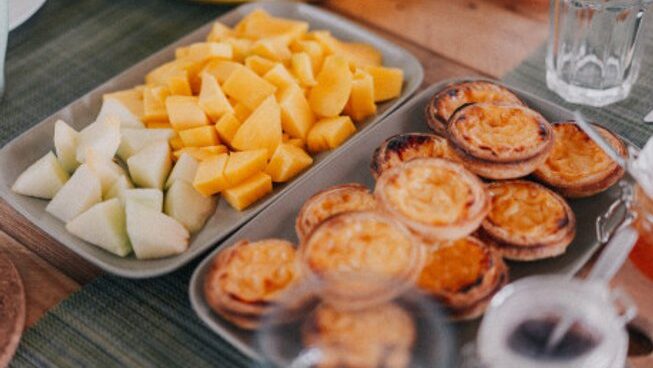fruit and Portuguese tarts at Balili Beach House surf camp in Peniche Porutgal