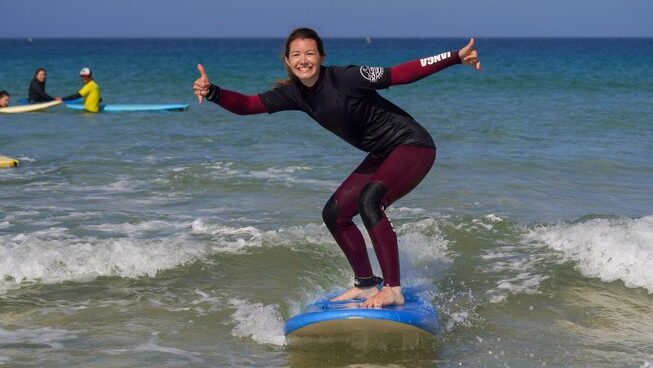 a learner surfer on a wave at Peniche with Boa Onda Guesthouse surf camp