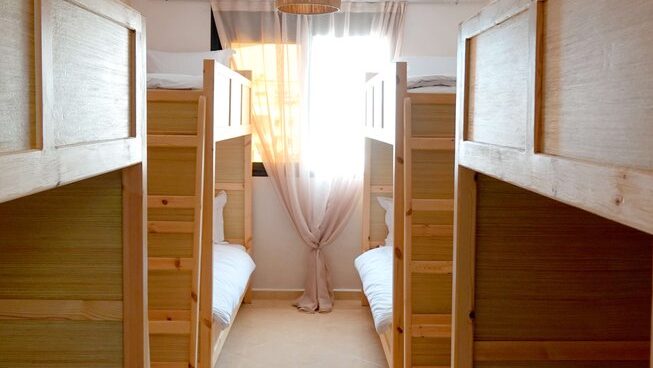 Dorm style bunk beds at Clapo Surf Morocco Imsouane surf camp