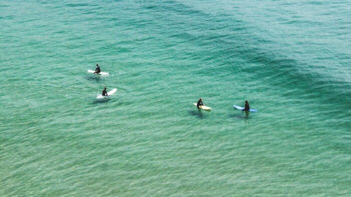 Imsouane surf camp Morocco with surfers in crystal blue water