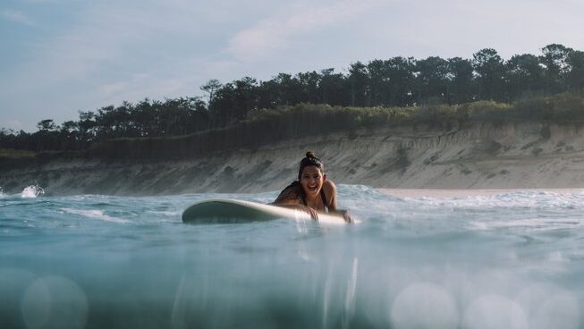 a learner surfer in the water at Maceda Surf Camp in Porto Portugal
