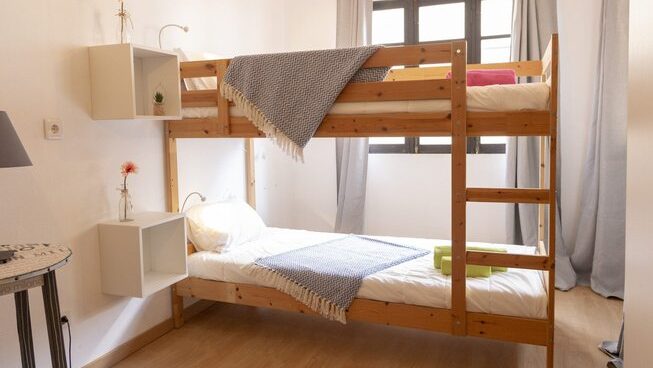 hostel style accommodation with bunk beds at Marias Hostel & Surf camp in Porto Portugal