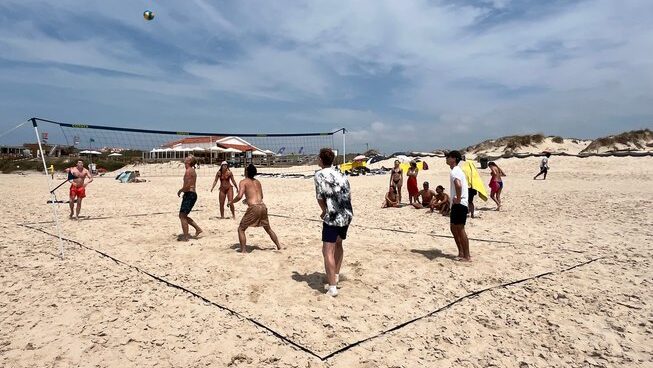 people playing volleyball at Peniche with Peniche surf lodge surf camp
