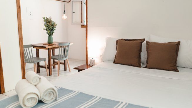 a bed and accommodaton at Pura Vida Surfers surf camp in Santa Teresa