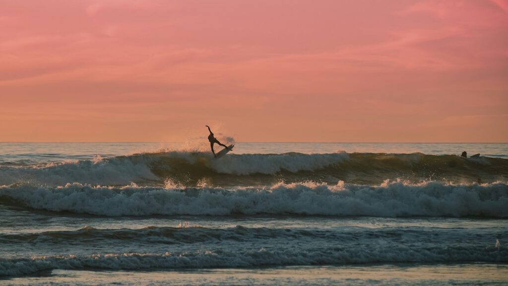 Blog A guy doing an aerial while surfing at Santa Teresa Costa Rica surf camp