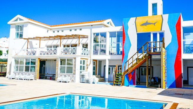 accommodation and pool at Shark’s Lodge surf camp in Peniche Portugal
