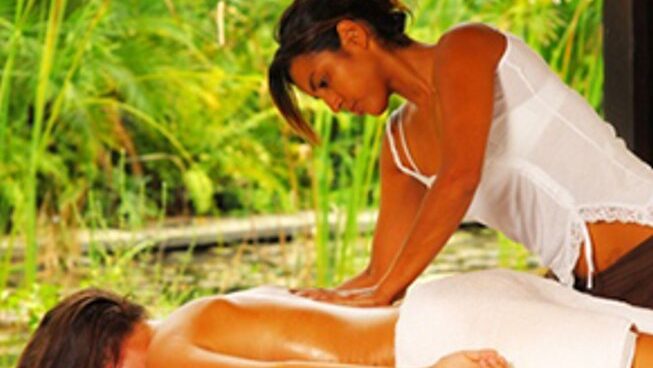 a person receiving a massage at Surfari Surf School surf camp in Nosara, Costa Rica