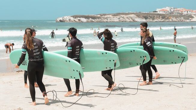 learner surfers looking to paddle out at Peniche with The Salty Pelican surf camp