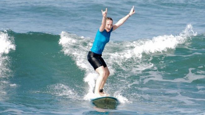 a learner surfer on a wave at Allride Surfer surf camp Taghazout
