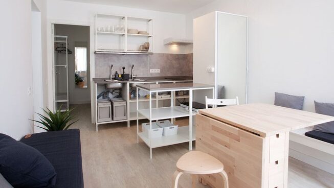 Accommodation with desk and kitchen at Lanzasurf surf camp