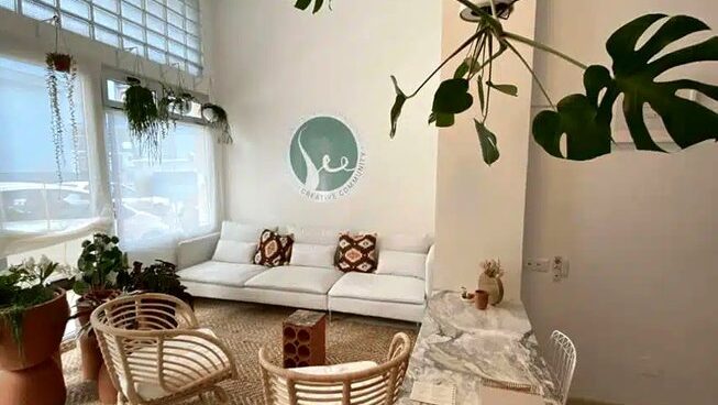 accommodation with couches and seats with See Yoga Holidays surf camp