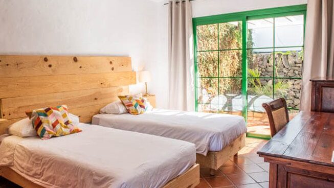 Accommodation with beds at all inclusive surf camp with Surfescape Fuerteventura