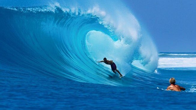 surfer in a big barrel with Kingfisher Mentawai surf camp