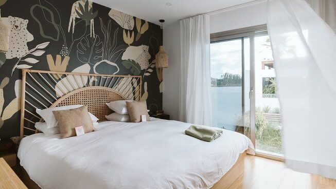 Bedroom with bed at The Salty Surf and Yoga surf camp