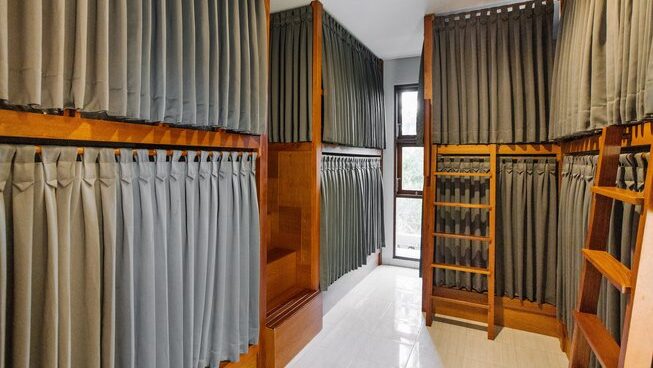 Bunk beds with curtain privacy partitions