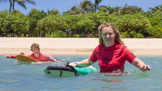 learner surfers at an Indonesia surf camp