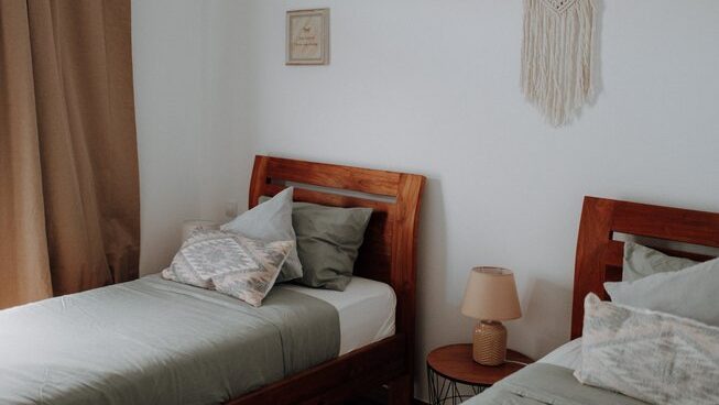two single beds at Surf & Yoga Retreats Fuerteventura