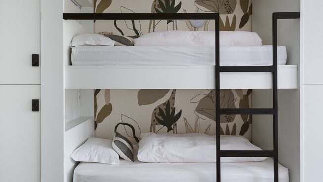 Dorm bunk beds at The Salty Peniche surf camp