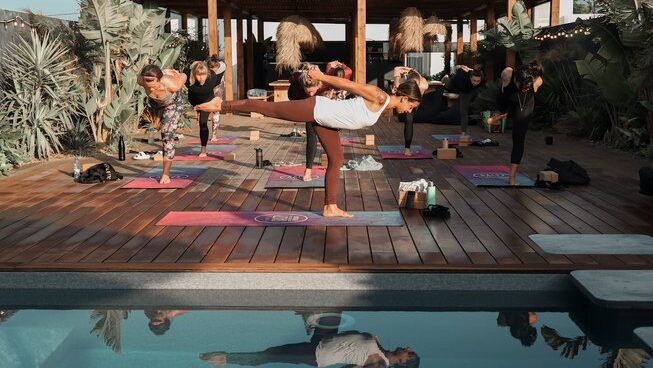 People doing yoga at The Salty Peniche surf camp