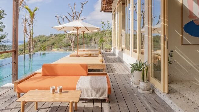 pool and pool deck chairs at Xanadu Surf & Yoga