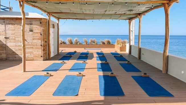 Yoga mats on a rooftop at Dfrost Almugar Surf House & Yoga Morocco