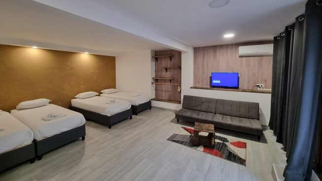 Accommodation bedroom and living space at G3 Store Surf Center Peniche
