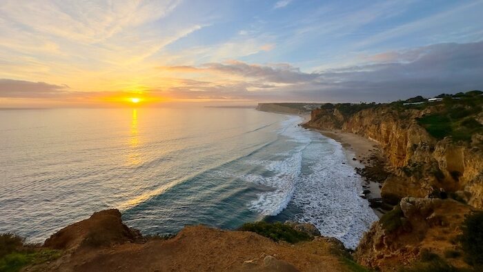 sunset over Lagos surf in Portugal