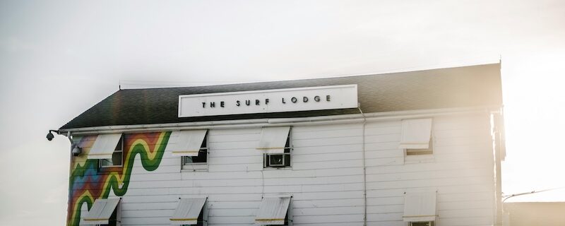 Sunset at a surf lodge, illustrating what is a surf camp.