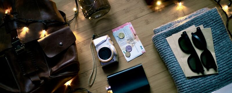 items all laid out where you would think What to pack for a surf camp