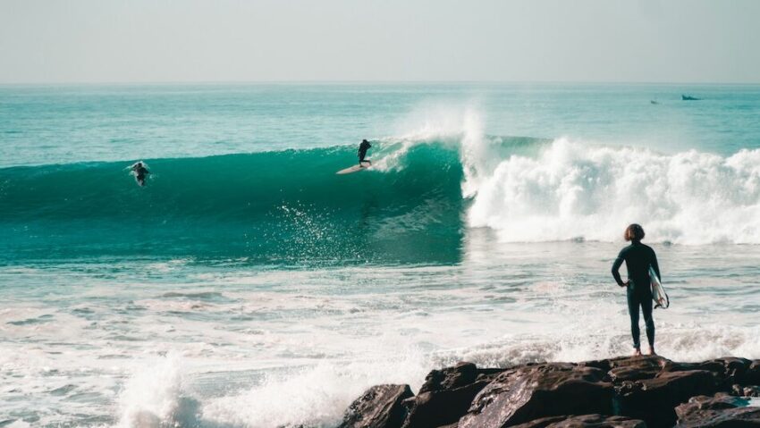 A surfer on a wave in Taghazout at Killer Point and when Morocco surf is good