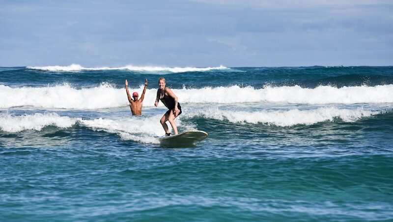 a learner surfer standing up for the first time