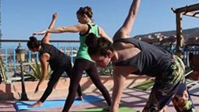 People practicing yoga at Crocro Surf Camp Maroc