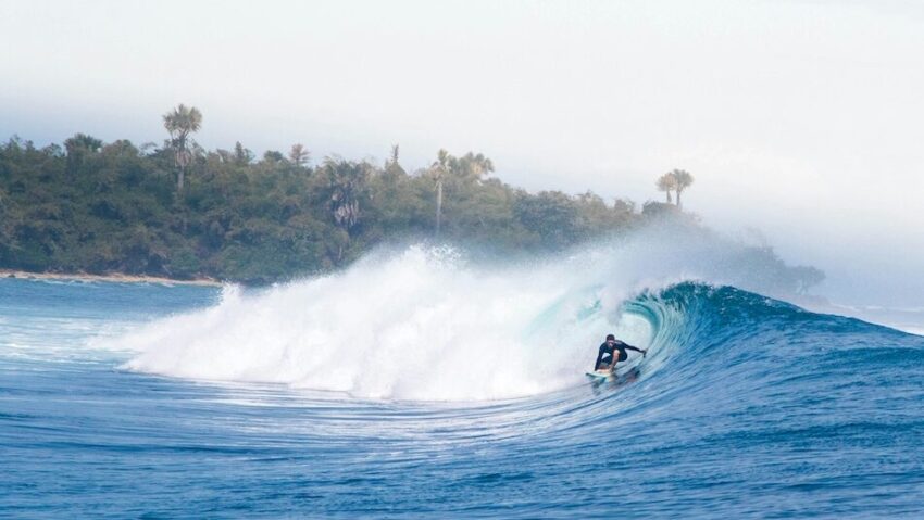 A surfer in a barrel in Java Indonesia