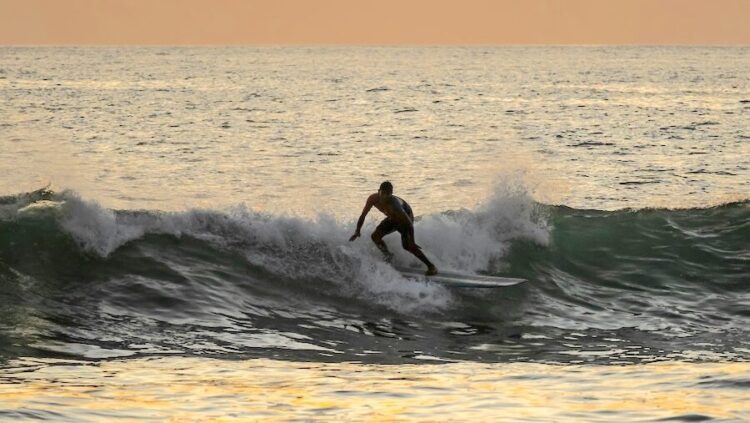 Surfer on a wave in Nosara Costa Rica