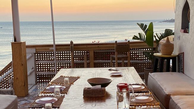 a table with plates in taghazout in Surf Coast Morocco