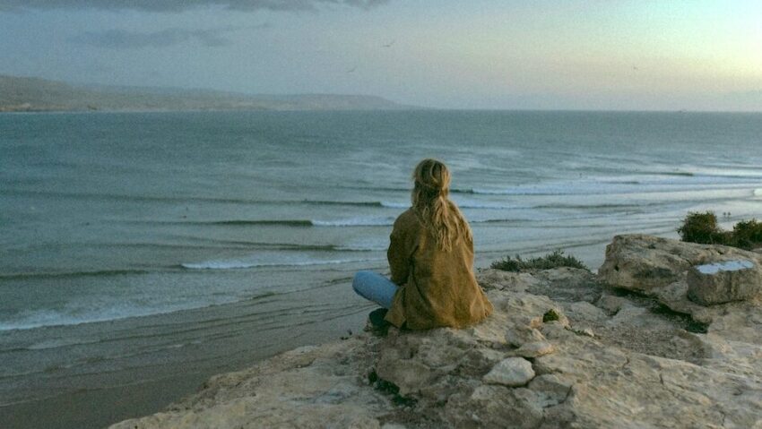 girl overlooking the surf in Morocco