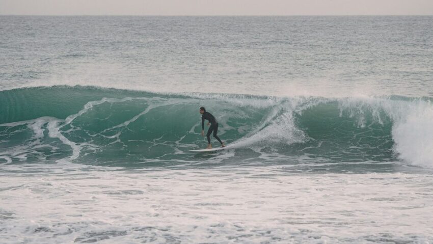 surfers on a wave at Anchor Point Taghazout Morocco