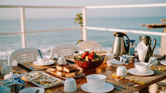 Meal overlooking the surf with Surf Coast Morocco