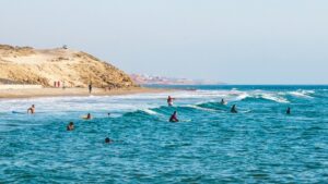 Surfers in the lineup with the best surf camp in Taghazout