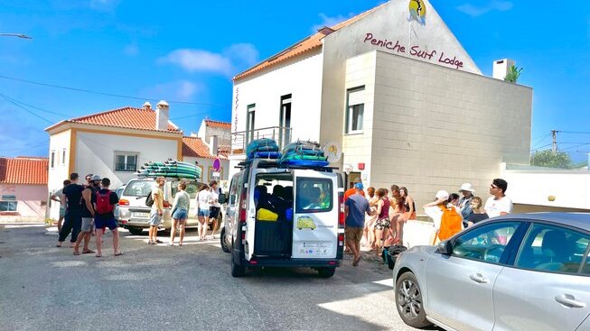 Surfers with Peniche Surf Lodge getting ready to go for a surf