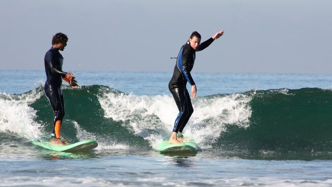 a learner surfer on a wave